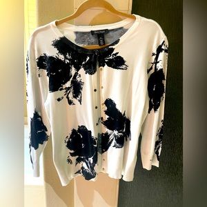 White and black sweater